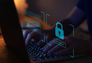 A person typing on a laptop keyboard with a digital security overlay featuring a lock and password field.